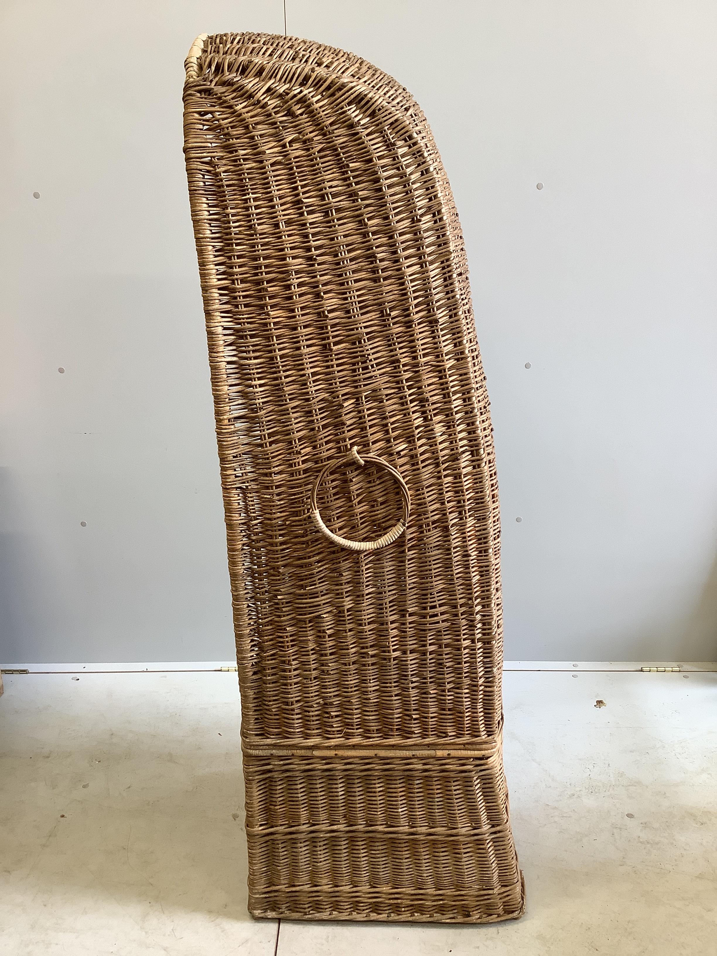 A vintage willow hall porter's chair, width 57cm, depth 49cm, height 158cm